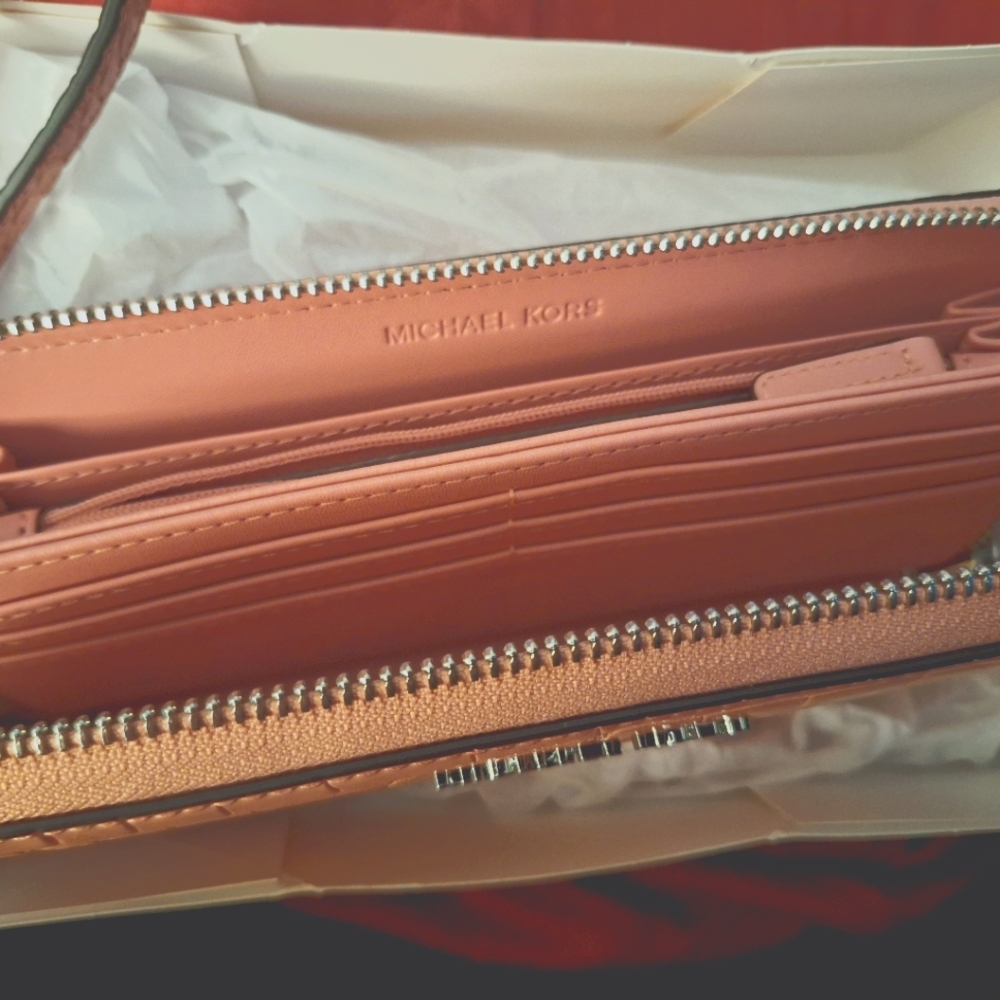 Michael Kors large zip around wristlet, bubble gum pink, alligator pattern,